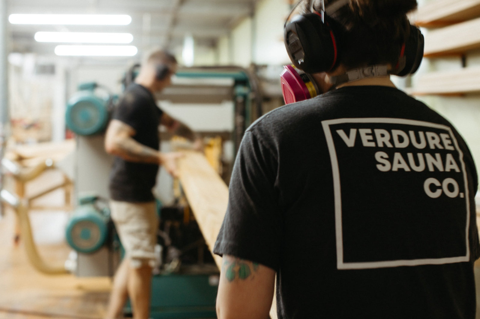 Feeding rough cedar into the molder